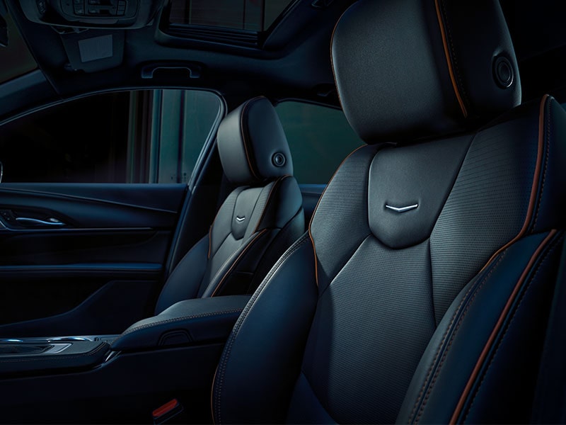 Driver's Front Row View of the 2026 CT4 Luxury Black Leather Seating with Red Trim