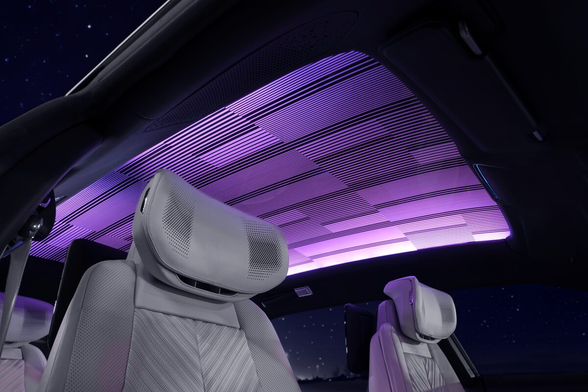 Cadillac CELESTIQ Smart Glass Roof Glowing With Soft Purple Light Above the Front Seats