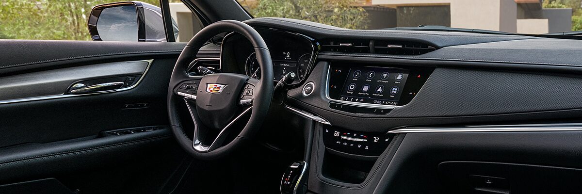 Front Passenger Seat View of the Control Switches and the Steering Wheel of the Cadillac XT6