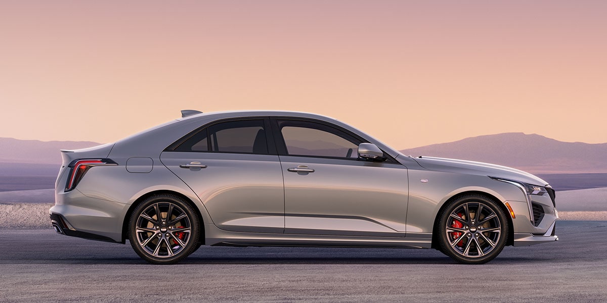 Side Profile View of a Silver 2026 CT4 Parked in the Open Desert