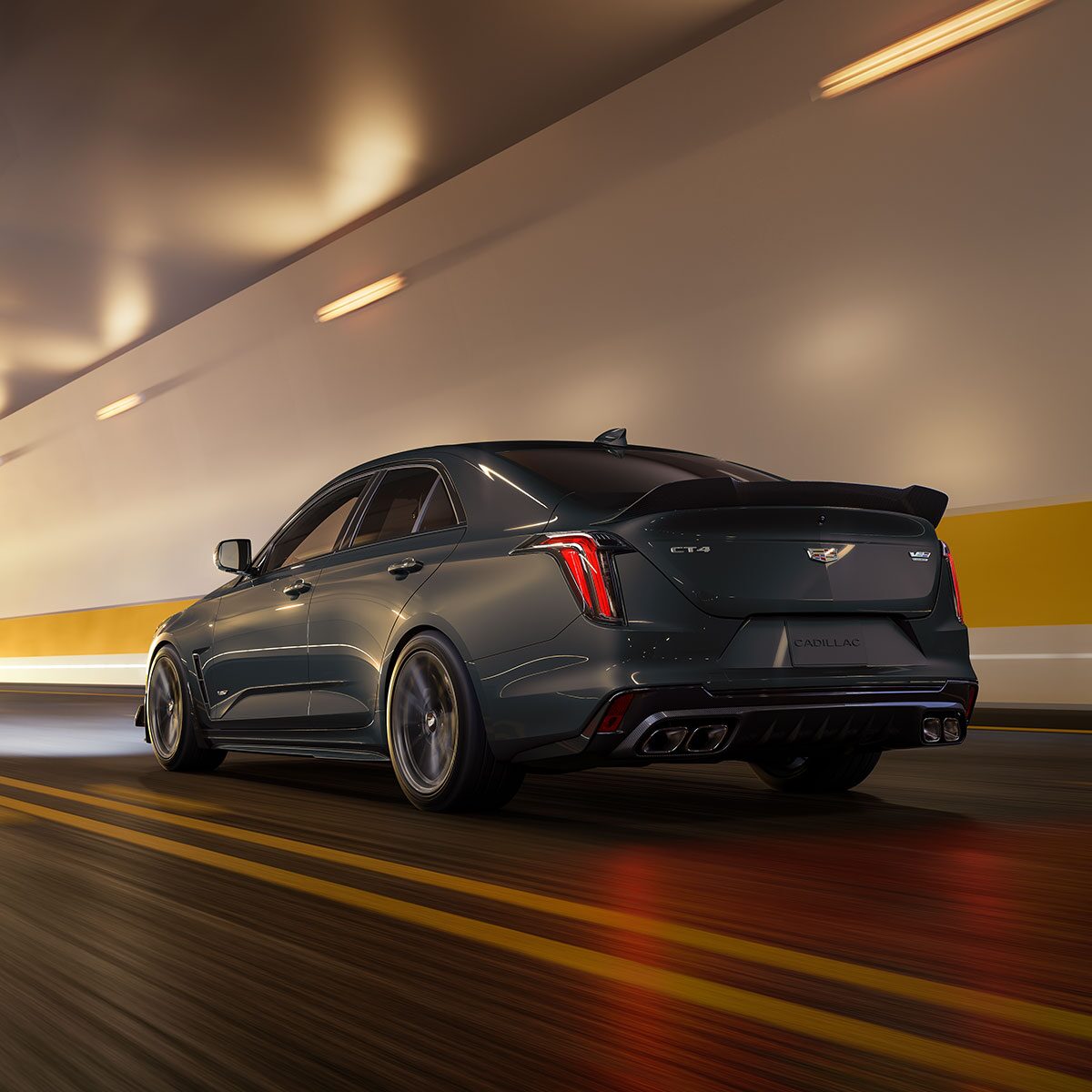 Rear View of a Yellow CT4-V Driving Through a Tunnel