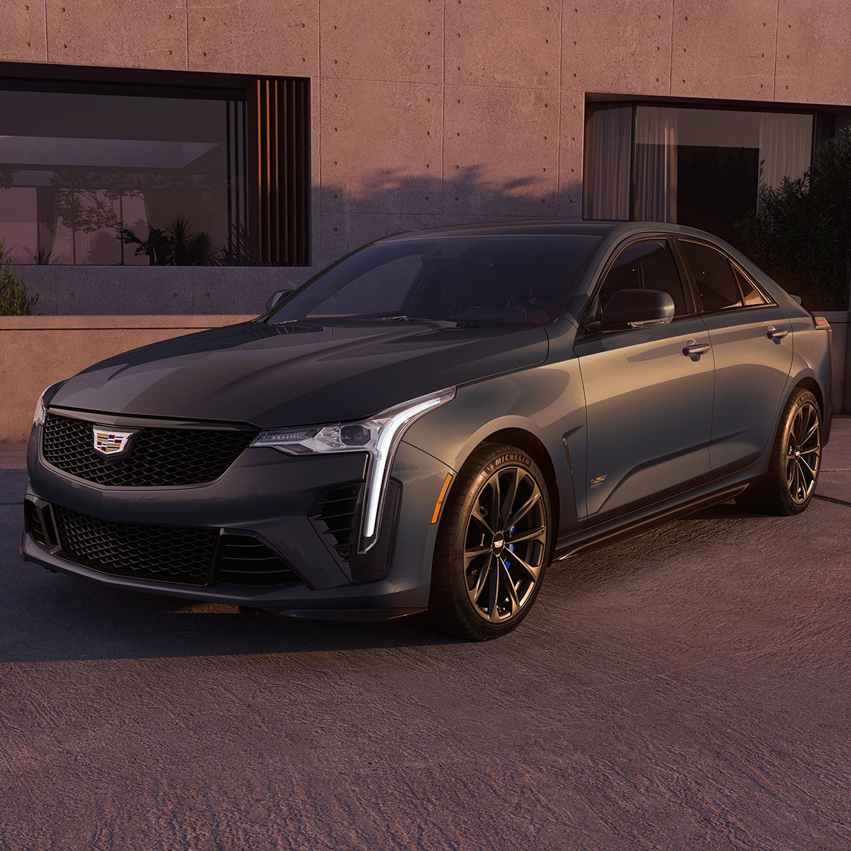 Three-quarters View of a Yellow Cadillac CT4-V Parked in Parking Garage