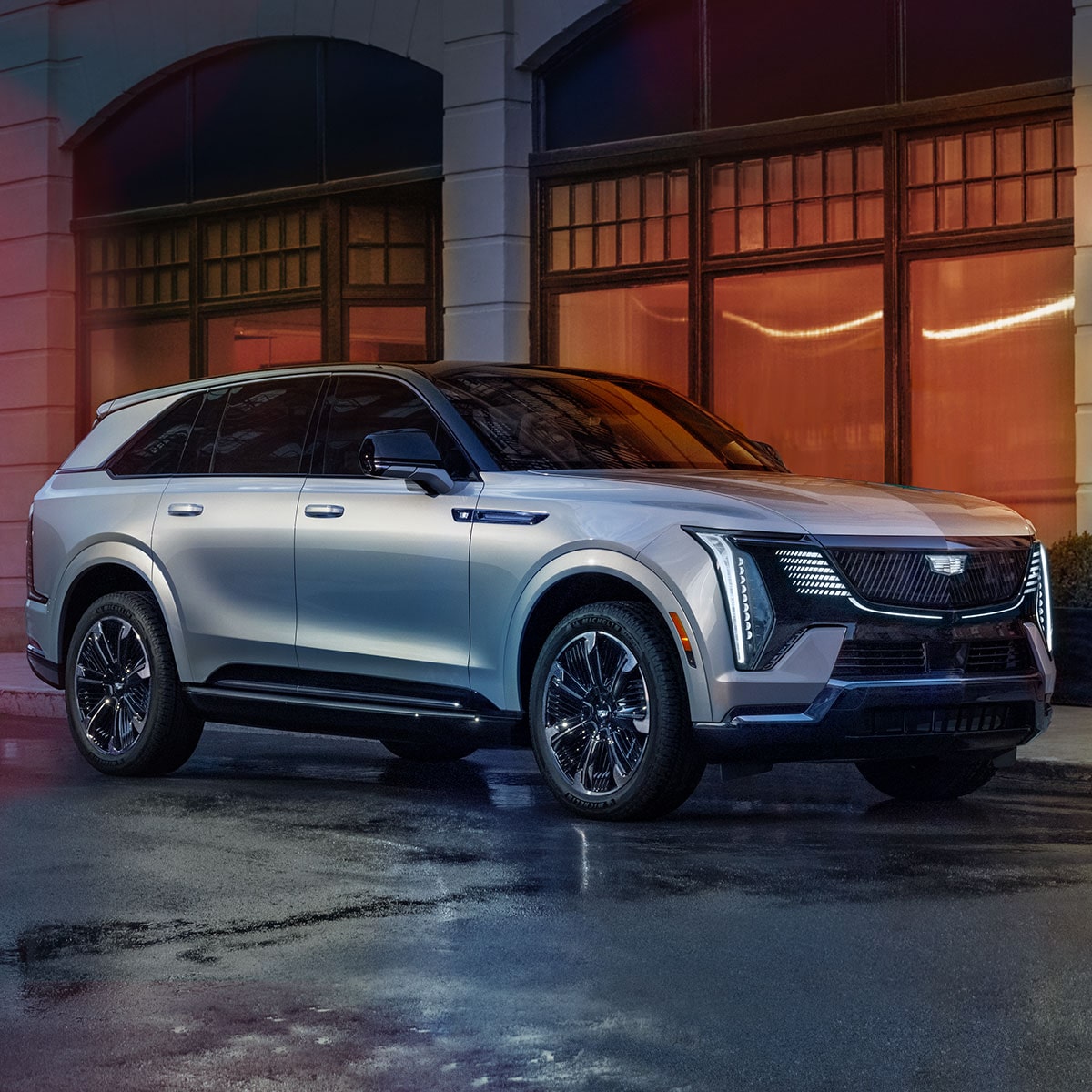 Front Profile of the 2025 Cadillac ESCALADE IQ Parked Outside of a Building