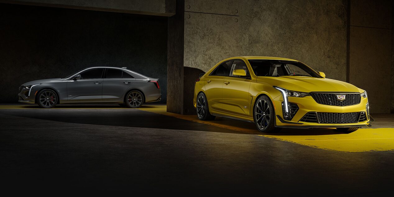 Two 2025 Cadillac CT4-V Sedans Parked in a Parking Garage